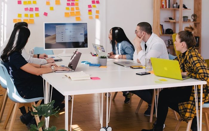 Marketing team collaborating around a table